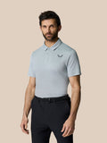 Male model wearing a light grey Golf Pinnacle Polo with short sleeves and a chest logo.