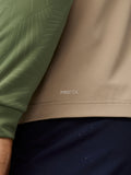 Close up of mushroom Golf Pinnacle gilet fabric with ProTek water resistant finish and quilted front panel