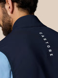 Back view of navy Castore Golf Pinnacle Gilet with branding along the collar.