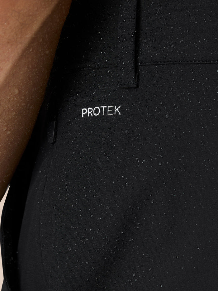 Detail of ProTek water resistant fabric and ankle zip on Golf Pinnacle trousers