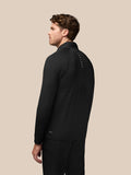 Back view of black Golf Pinnacle Jacket on model with Castore branding along the back.