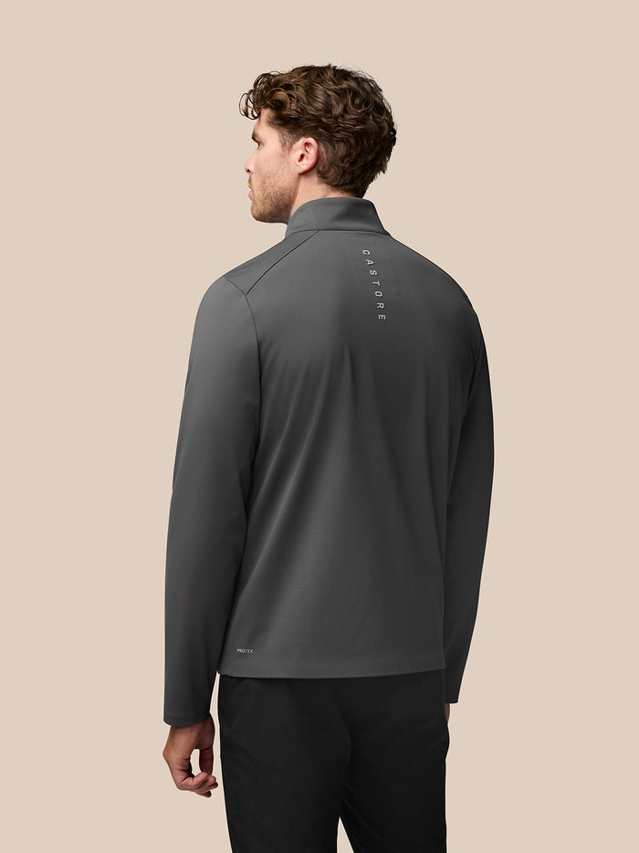 Back view of charcoal Garcia Hybrid Jacket with vertical Castore branding along the spine.