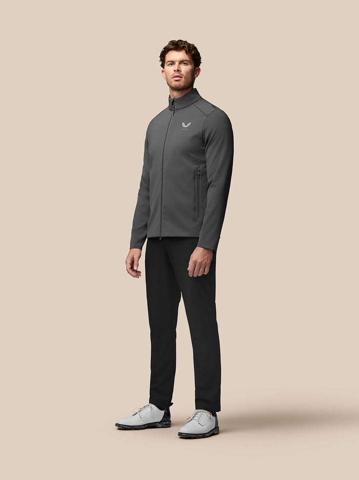 Front view of a model wearing the charcoal Garcia Hybrid Jacket with stand collar and front zip