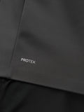 Close up of charcoal Protek fabric with Protek branding on the jacket.
