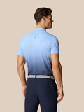 Back view of model wearing Club Graphic Polo in sky blue with gradient print and Castore branding on the upper back