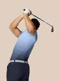 Side angle view of golfer in Club Graphic Polo Sky Blue showing the gradient pattern and Castore branding.