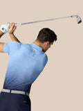 Back view of a golfer in Club Graphic Polo Sky Blue during a swing, with the ombre pattern visible.