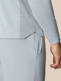 Close-up of the back hip area of the mid grey LVS 1/4 Zip Top with a side pocket and panel detailing.