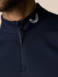 Close up of navy Club Classic half zip gilet collar showing zipper pull and Castore emblem.