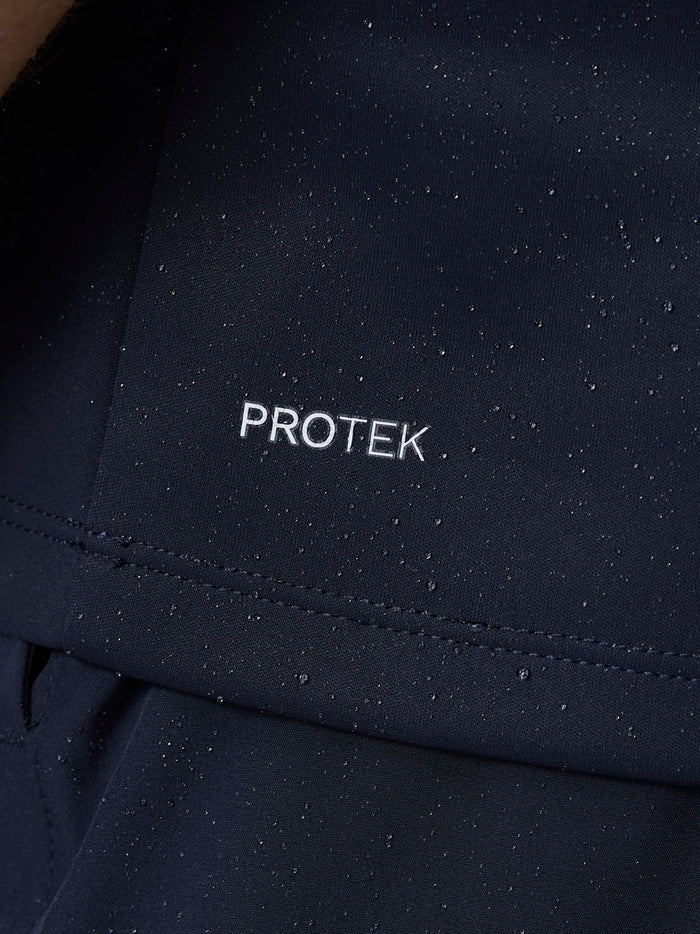 Close-up of navy ProTek fabric with water droplets to highlight its water resistant finish