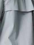 Golf Pinnacle LVS Woven Jacket back view in mid grey featuring vent panel and curved hem