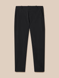 Front view of black Golf Pinnacle Winter Trouser showing waistband with button and zip fly.