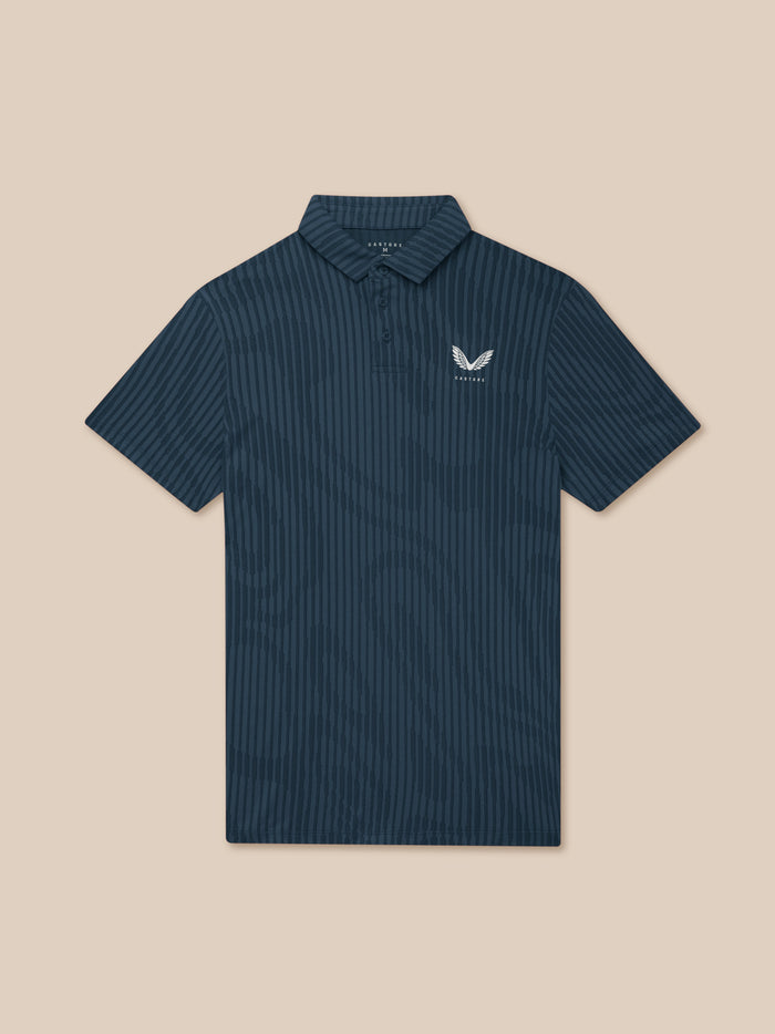 Close up of Golf Pinnacle Engineered Knit Polo in midnight navy with striped knit pattern and left chest logo