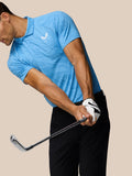 Back and side view of male in blue Glow Polo with AerTek label at the hem and black shorts.