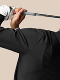Close-up of a golfer wearing a black Pinnacle Performance Hoodie gripping a golf club.
