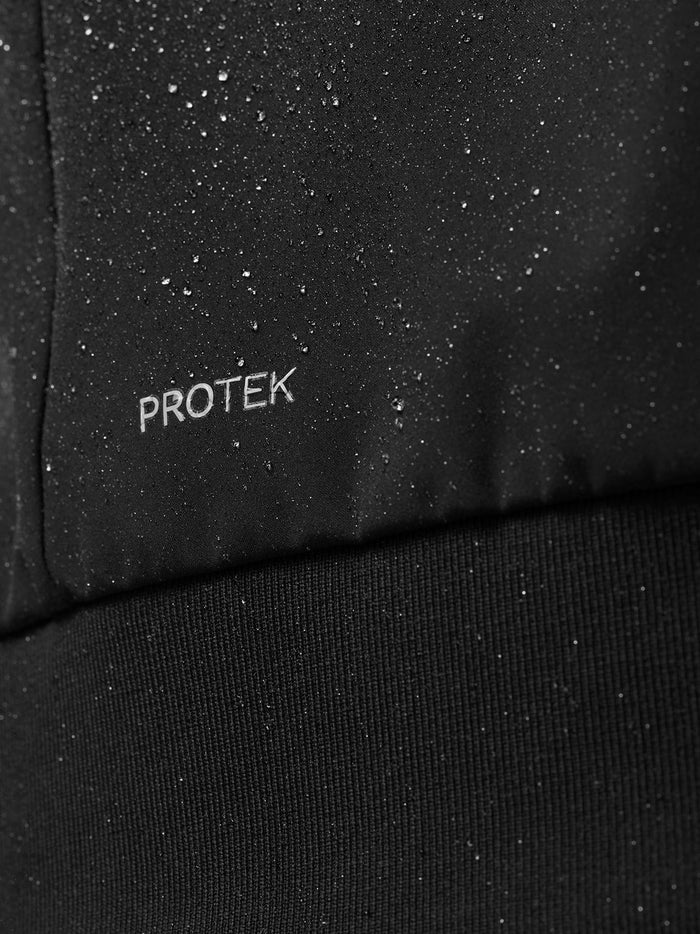 Close-up of black ProTek fabric with water droplets and ProTek branding.