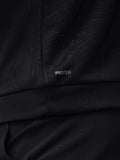 Close-up of black Golf Club Classic Quarter Zip fabric with subtle pattern and ProTek branding.