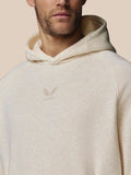 Beige hoodie with a brand logo on a beige background