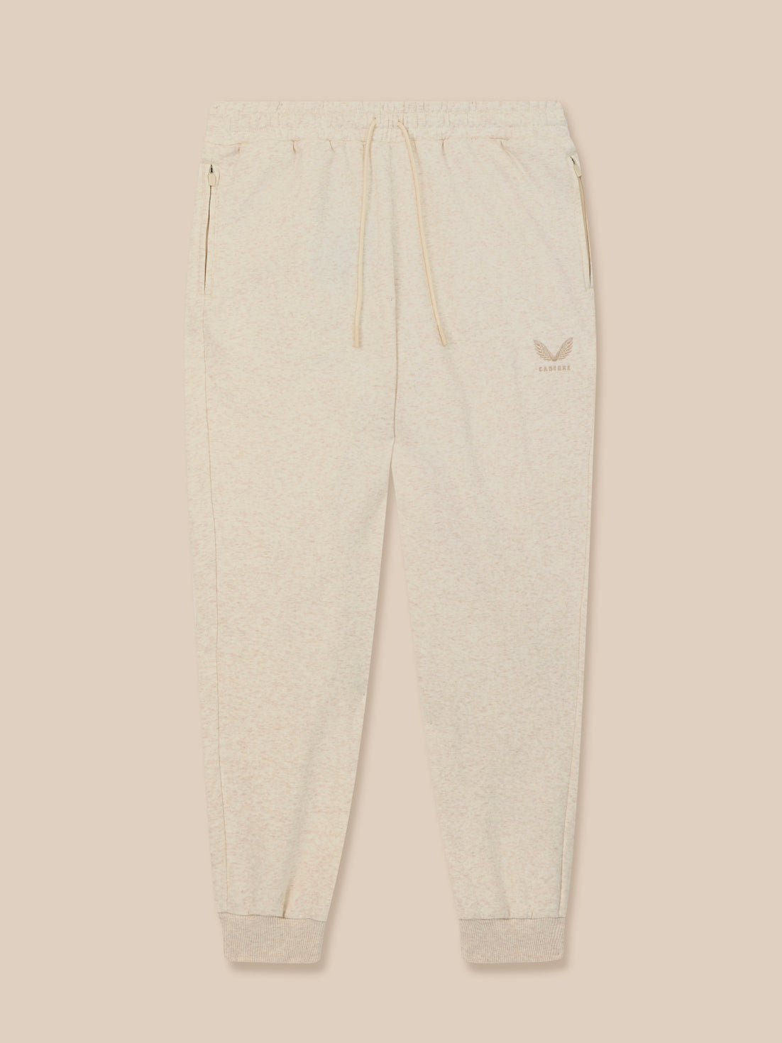 Beige sweatpants on a beige background