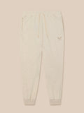 Beige sweatpants on a beige background