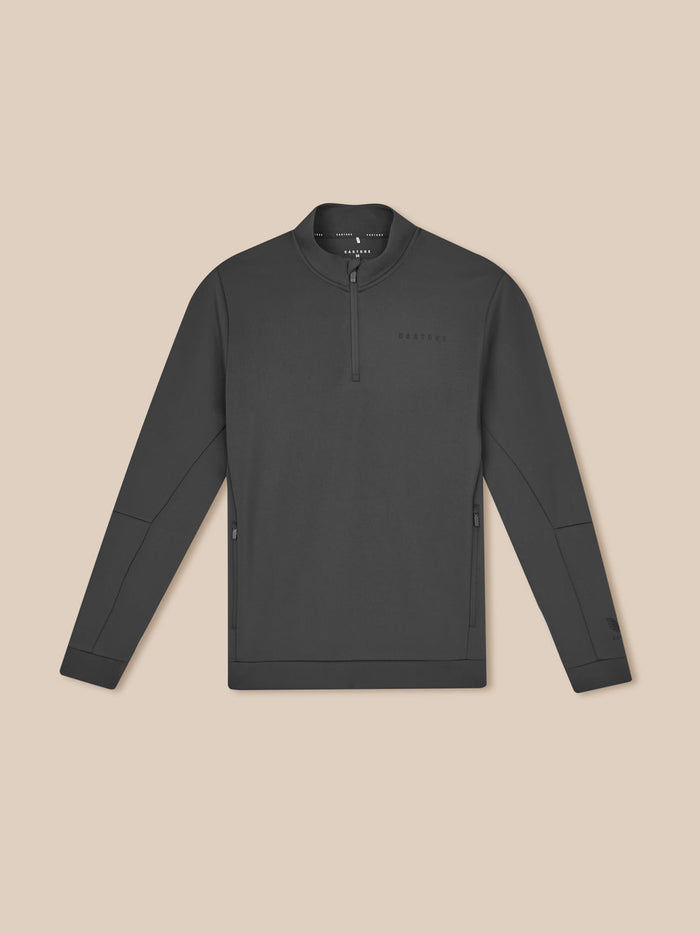 Front view of gunmetal Men’s Flex Long Sleeve Quarter Zip Sweatshirt on a beige background