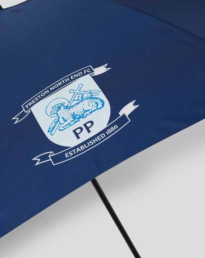 Close-up of blue Preston North End FC umbrella fabric showing the crest