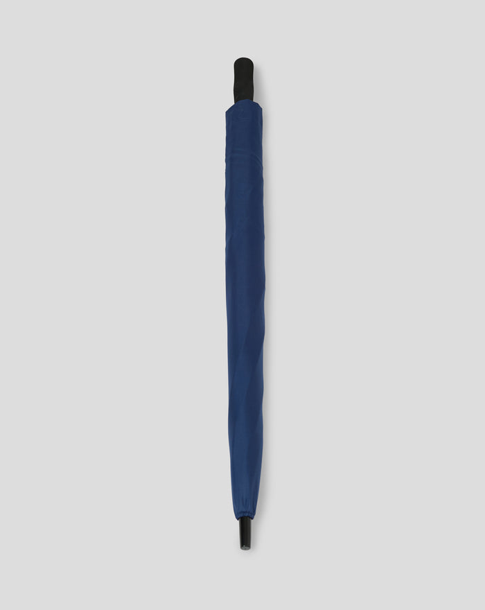 Folded blue Preston North End golf umbrella with black handle shown upright