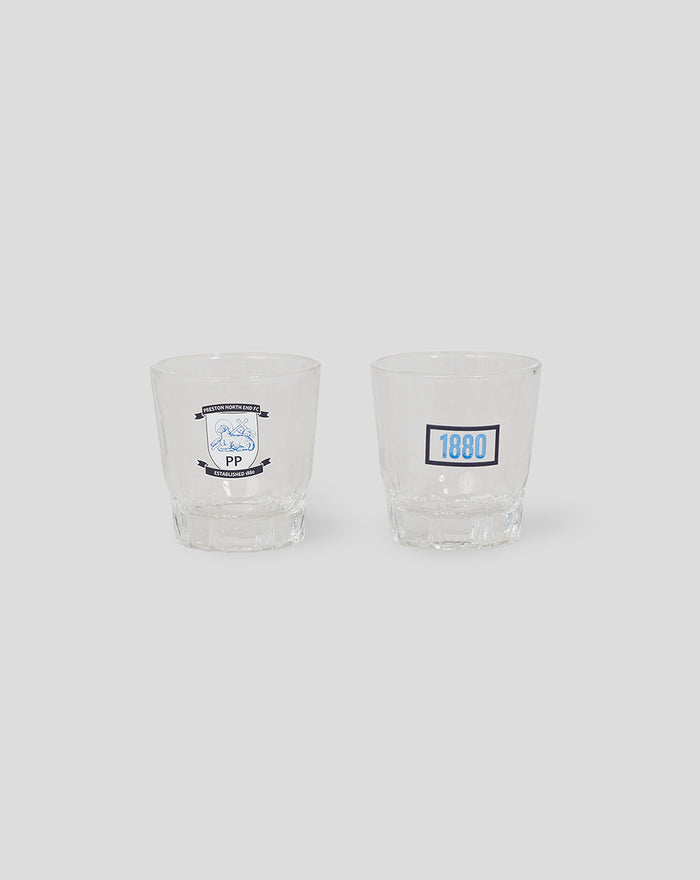 Two clear shot glasses; left features the Preston North End FC crest and the right shows a blue 1880 label.