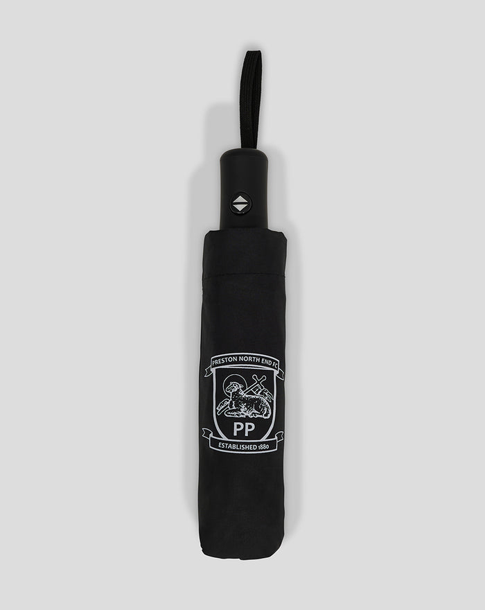 Folded black umbrella with Preston North End FC crest on the sleeve