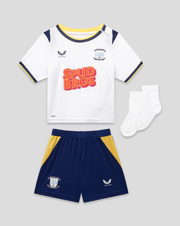 Front view of PNE baby 26/27 home kit three piece set white shirt navy shorts and white socks with yellow accents.