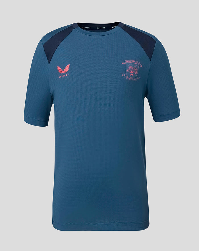 Blue junior training short sleeve tee with dark navy shoulder panels and crest on the chest