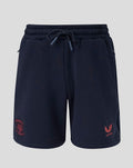 Navy travel fleece shorts with coral club crest on the left leg and Castore wing logo on the right leg.