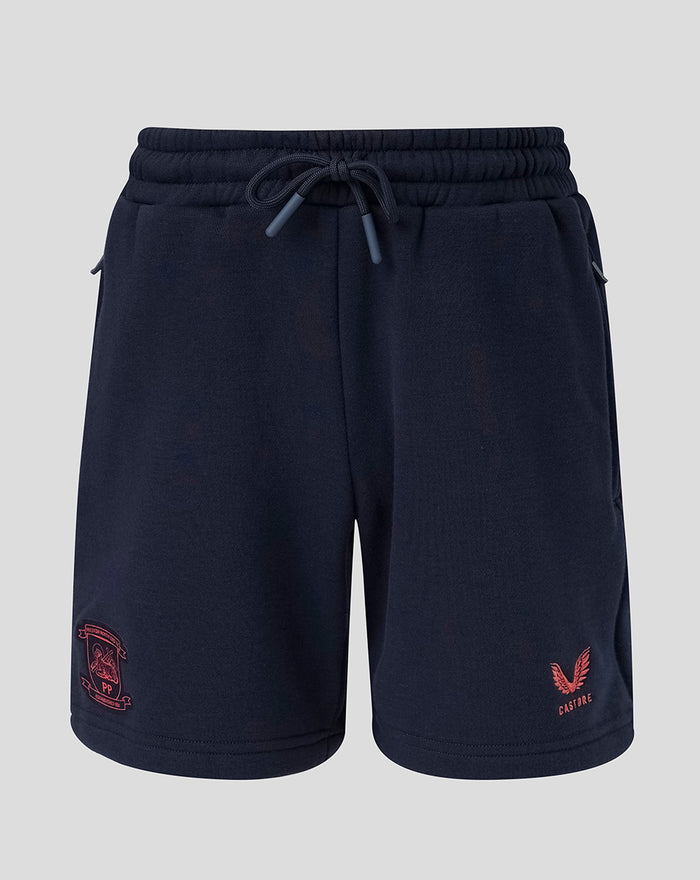 Navy travel fleece shorts with coral club crest on the left leg and Castore wing logo on the right leg.