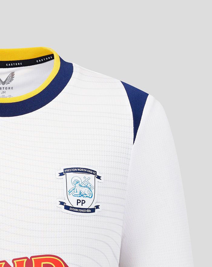 Left chest Preston North End crest on white jersey with blue trim on shoulder