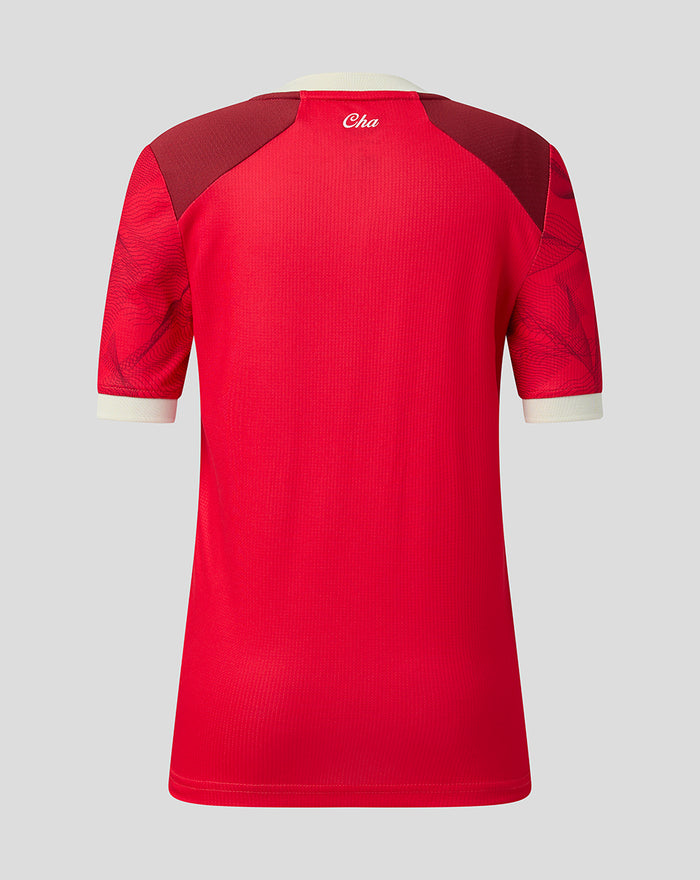 Back view of red PNE Junior third short sleeve shirt with cream neck and cuffs and maroon shoulder panels