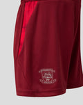 Side view of maroon PNE Junior 2026/27 Third Shorts featuring a red pocket panel and crest patch