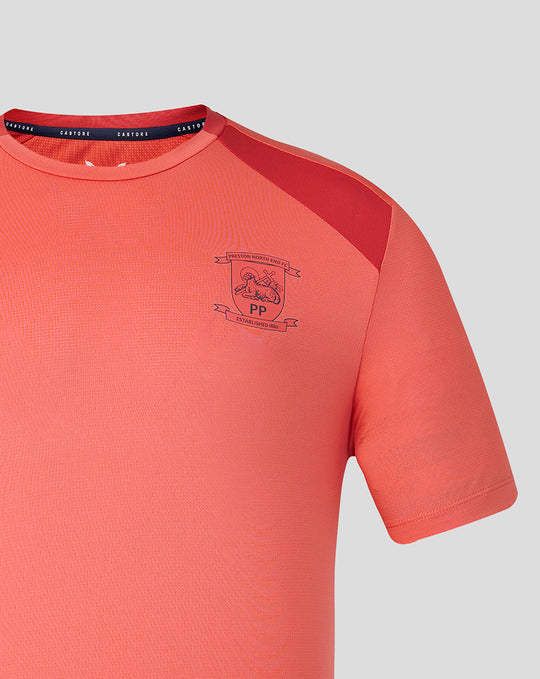 Rose pink PNE training short sleeve tee with club crest on chest and navy neck trim.
