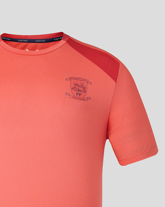 Rose pink PNE training short sleeve tee with club crest on chest and navy neck trim.