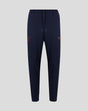 Navy Travel Adapt fleece joggers with drawstring waist, secure pockets and coral branding on the leg.