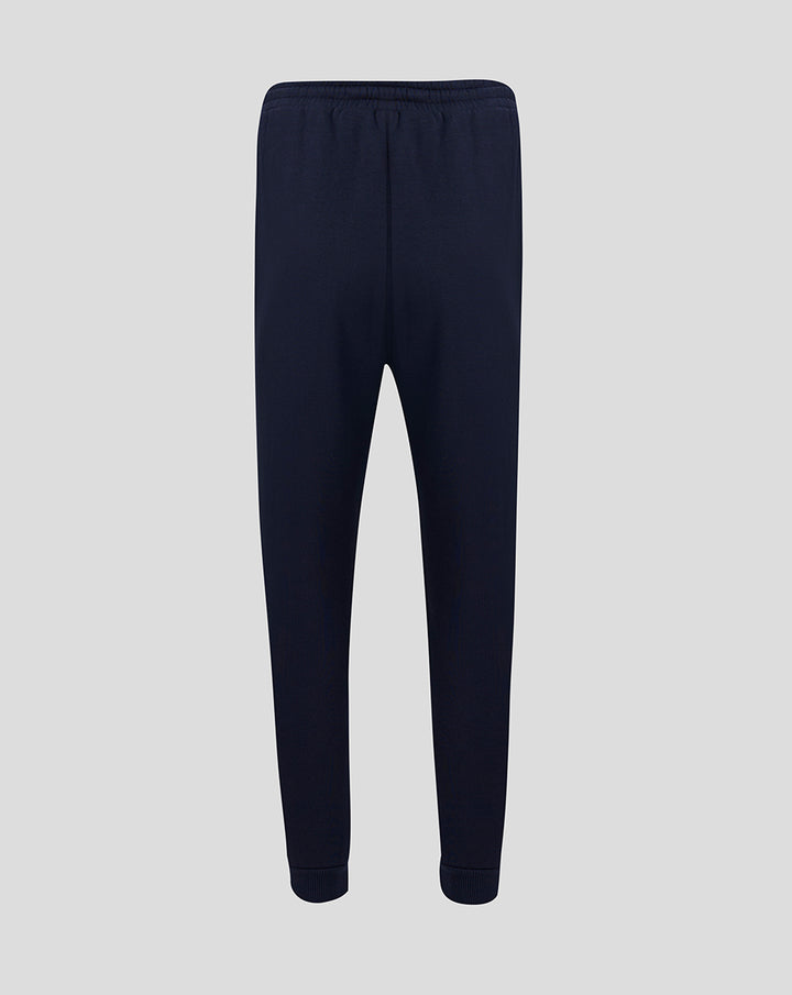 Back view of navy Travel Adapt fleece joggers with elastic waistband and tapered fit.