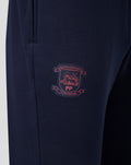 Close-up of navy fabric with Preston North End crest on the thigh.