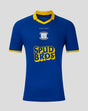 Blue away shirt with yellow collar and cuffs, club crest on chest and SPUD BROS sponsor across front