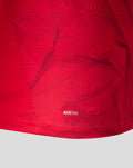 Close up of red PNE third shirt hem showing the wave pattern and AERTEK branding