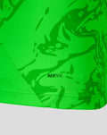 Close up of neon green jersey fabric with a textured pattern and the AERTEK branding.