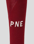 Close up of maroon Preston North End third sock with white PNE letters.