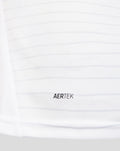 Close up of white textured fabric with AERTEK branding from the PNE 26/27 home shirt