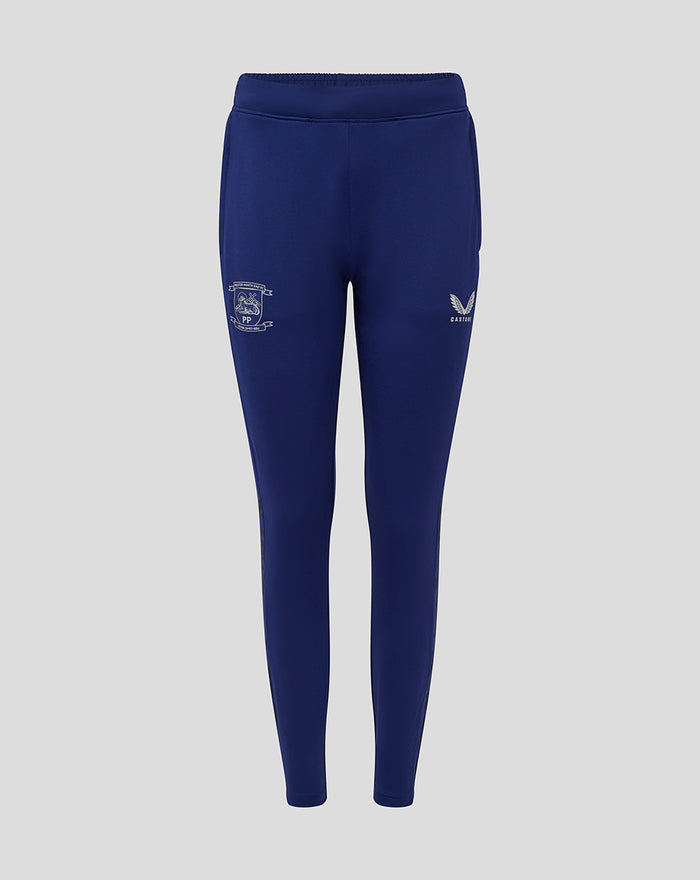 Front view of women's training knit pant in blue with crest and wing logos on the thighs.