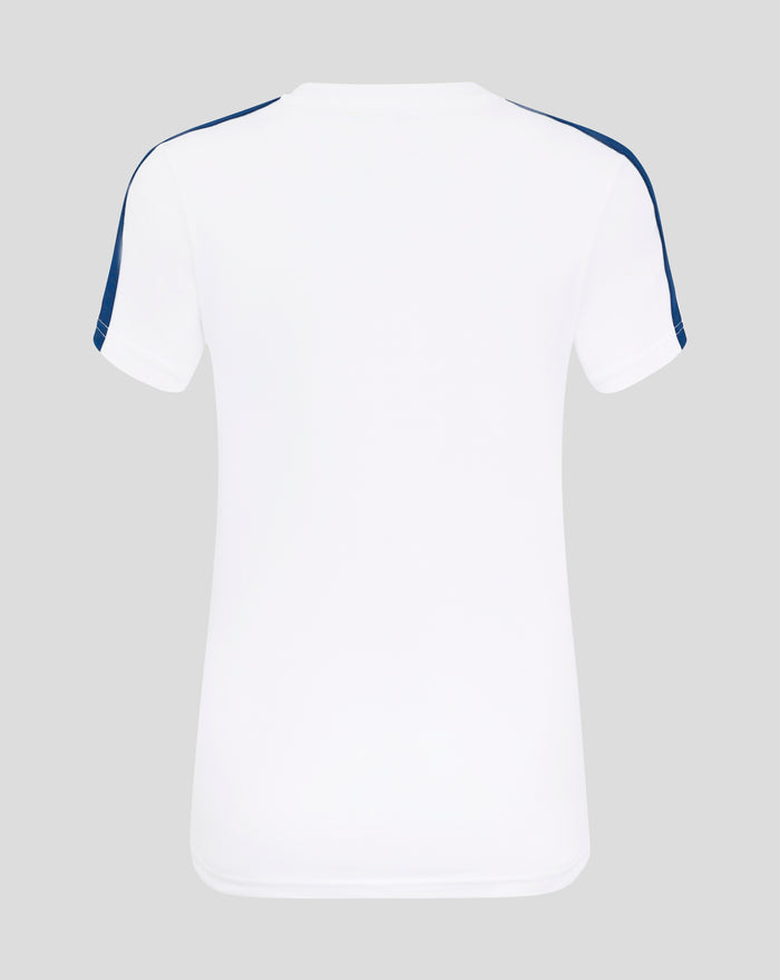 Back view of a white T-shirt with blue piping along the shoulder seams.