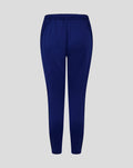 Back view of junior training knit pant in blue with elastic waistband.