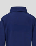 Back view of blue junior training packable hooded shower jacket with hood up.